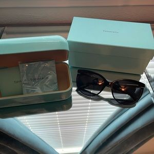 Tiffany & Co sunglasses with baby blue and gold detail. NEW